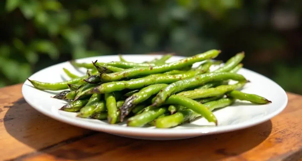 Une assiette de haricots verts grillés, une portion parfaite par personne pour un repas sain et savoureux en extérieur.